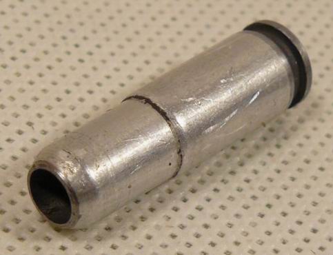 Wkładka redukcyjna stosowana w polskim 5,6mm pistolecie maszynowym wz. 43 oraz 5,6mm pistolecie wz. 33 "Sportowy". Za zdjęcie dziękuję użytkownikowi "amunicja" z serwisu Allegro